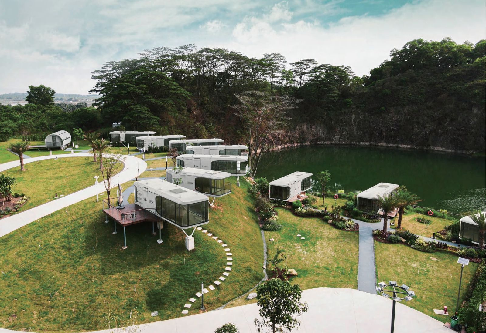Eco resort project with modular cabins on quarry lake hillside