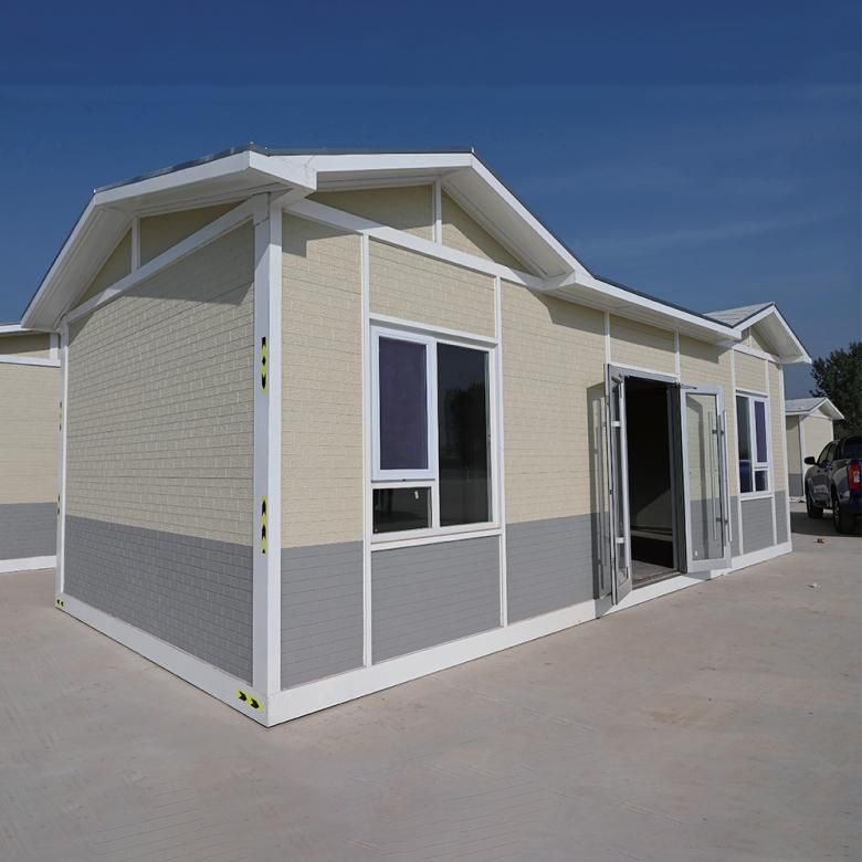 Flat pack modular unit with gabled roof on concrete base